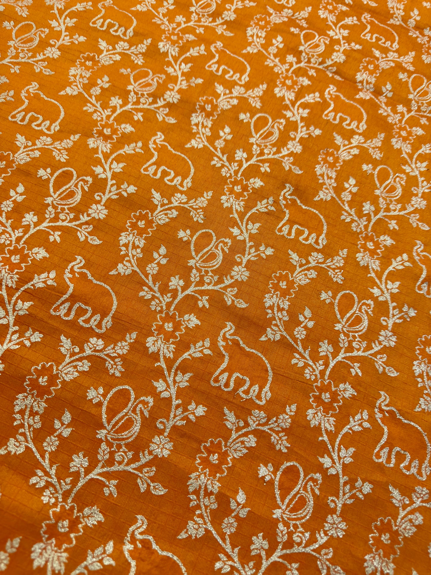 Premium orange Silk Brocade Banarasi Fabric with Elephant & Floral Motifs 44inch width