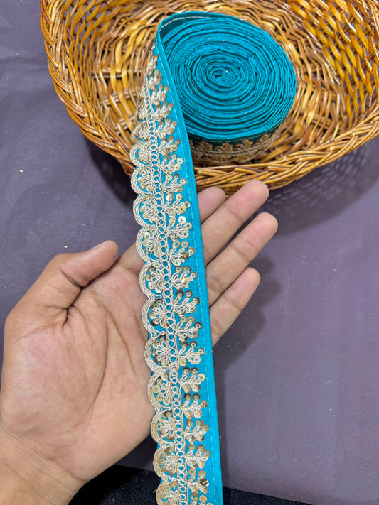 rawsilk fancy lace border with coding work sequence  (pack of 9 meter)Turquoise Blue.